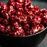 Bloody Red Velvet Popcorn bowl filled with delicious red treat.