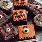 Halloween food treats and festive cakes for a spooky party celebration