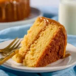 Delicious homemade caramel cake with a rich caramel drizzle on top.