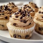 Chocolate chip cookie dough cupcakes with frosting and cookie dough topping