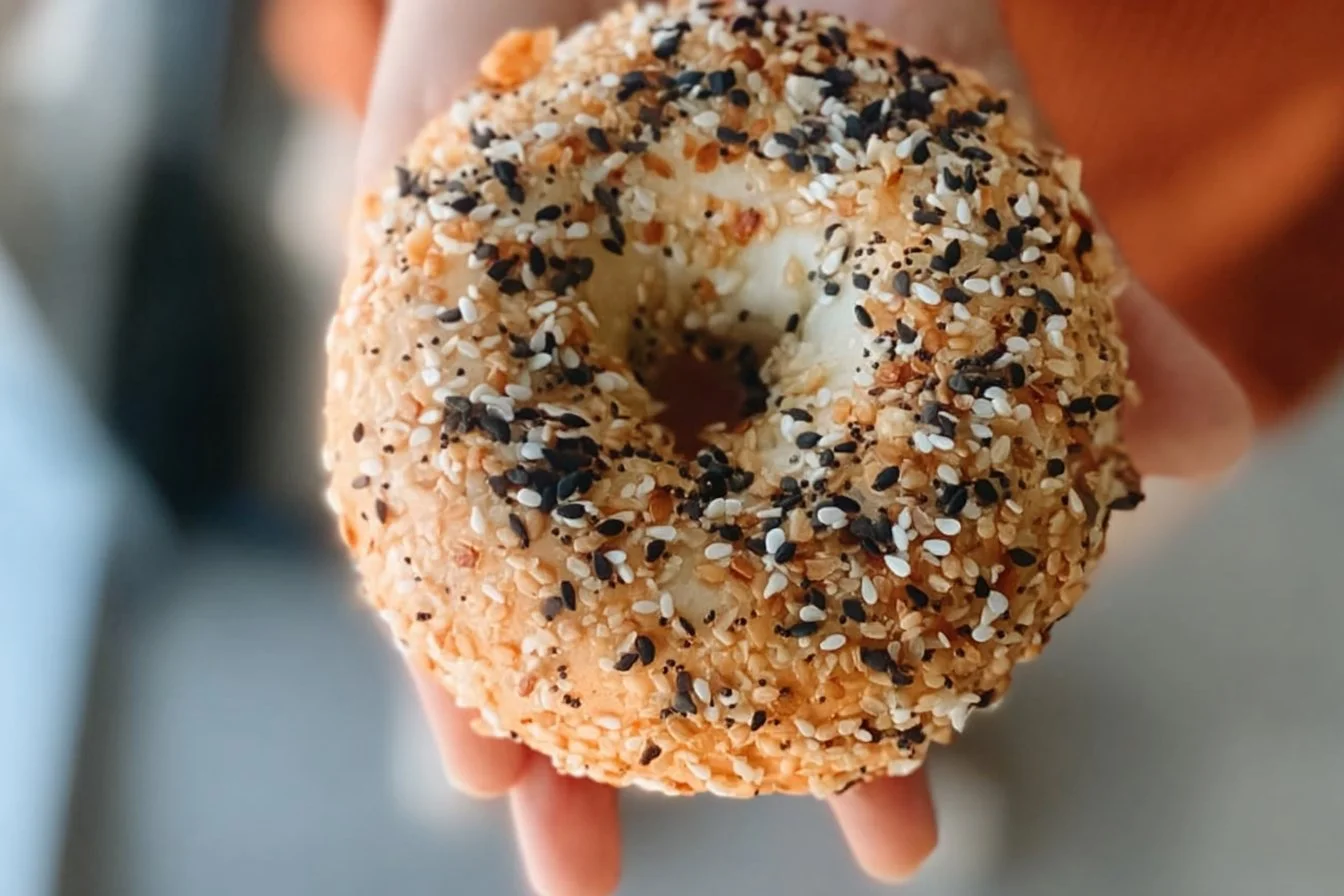Protein bagels with cottage cheese topped with seeds and herbs