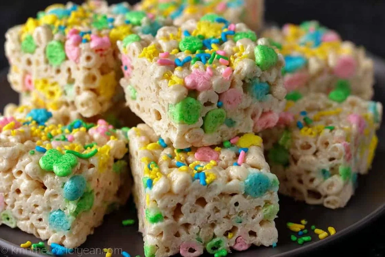 Bowl of Lucky Charms Marshmallow Rice Krispies treats with colorful marshmallows.