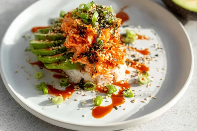 A delicious dish of Sushi Bake with Salmon, topped with fresh ingredients and baked to perfection.