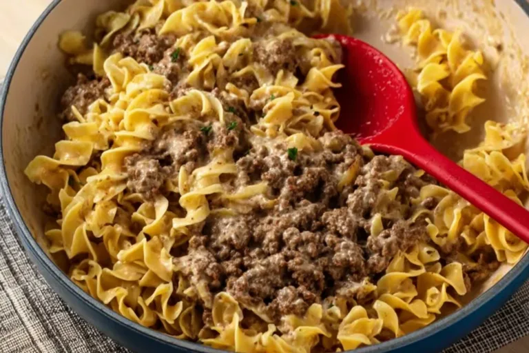 Delicious 30-minute ground beef stroganoff served in a bowl with garnishes.