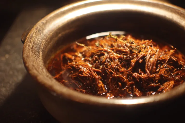Delicious slow cooker beef brisket served with vegetables and herbs