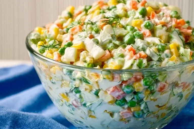 Creamy Savoy cabbage salad served in a bowl with fresh ingredients.