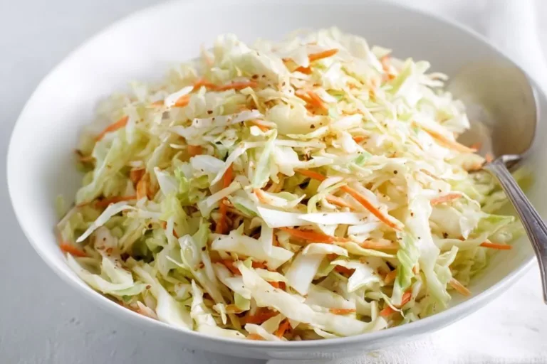 Bowl of delicious vinegar coleslaw made with fresh vegetables and tangy dressing