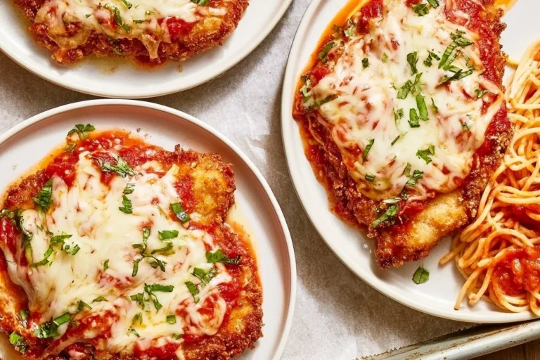 Delicious baked chicken Parmesan topped with cheese and marinara sauce