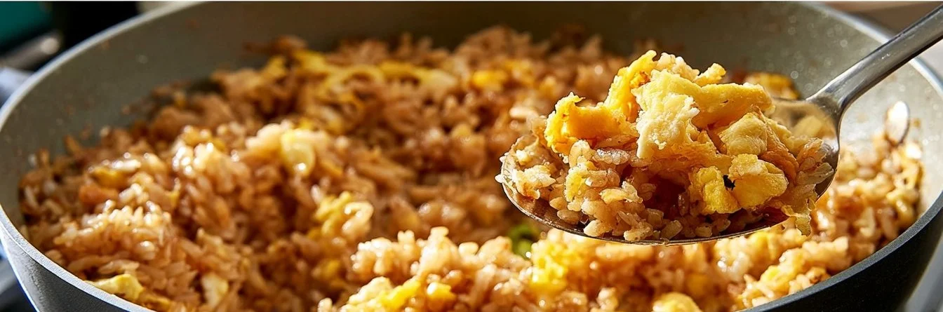 Bowl of easy homemade fried rice with vegetables and eggs